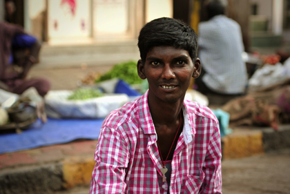 The youngster portrait was taken at the Carnac Rd just near the Mahatma Jyotiba Phule Mandai, formerly 'Crawford Market' in Mumbai, which is one of South Mumbai's most famous markets. Read about portrait photography in this archive story.