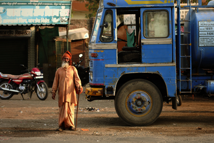 Driving between locations in the Maharashtra state the photographer met a 'Baba' near a road wearing saffron-colored clothing in a small market town of Maharashtra. Read about Maharashtra in this archive story.