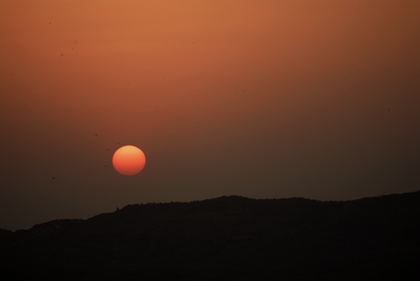 Some believe that the sun is a representation of the higher self, while others see the sun as a god to be worshiped. In India where this travel photograph was photographed the sun is setting in. Read more about landscape photography in this archive story.